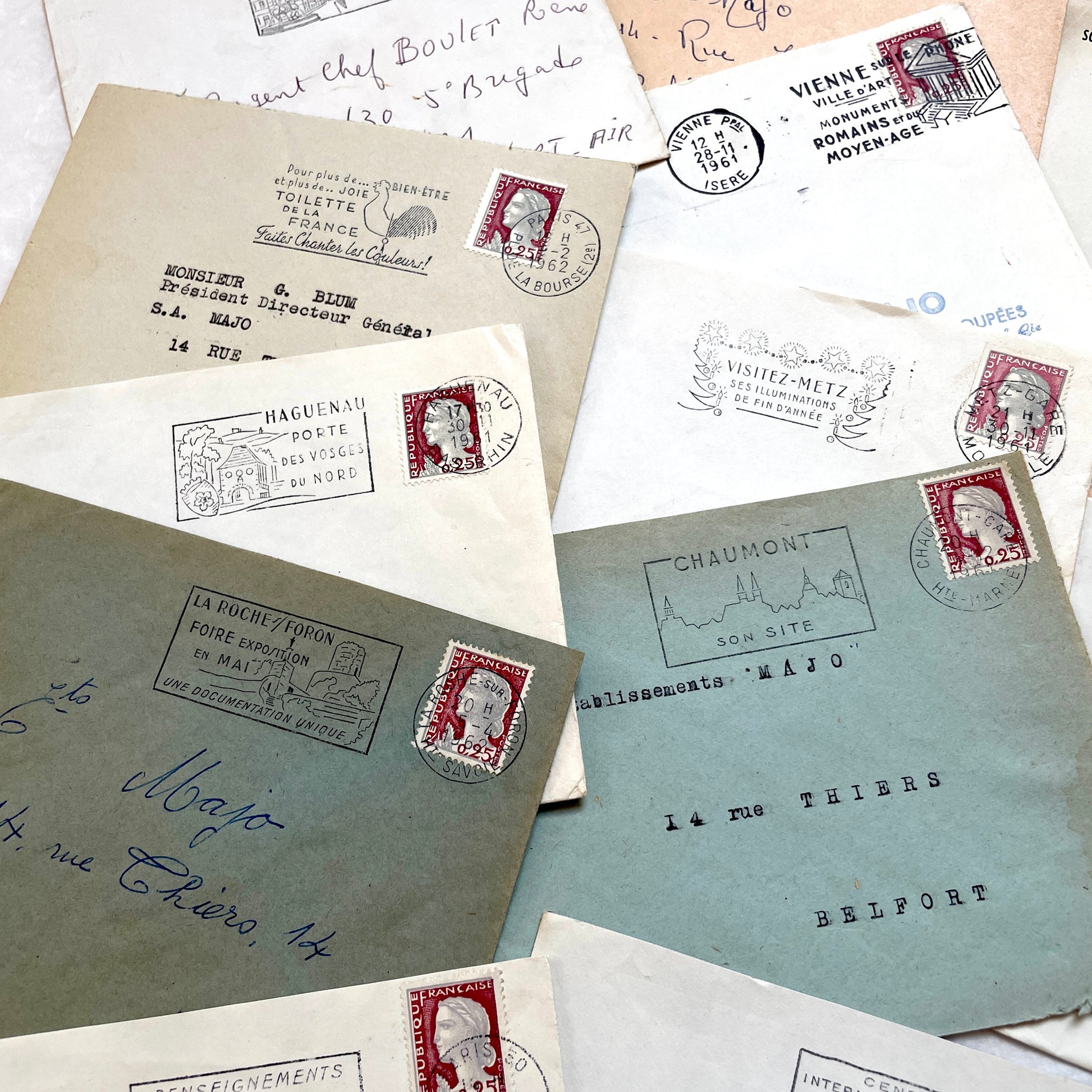 A batch of 20 vintage 1960s French envelopes featuring assorted postmarks, handwritten addresses, and Republic Française stam