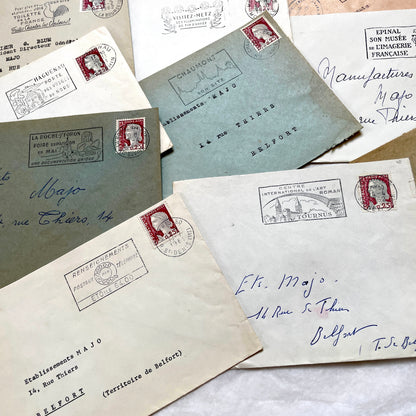 A batch of 20 vintage 1960s French envelopes featuring assorted postmarks, handwritten addresses, and Republic Française stam