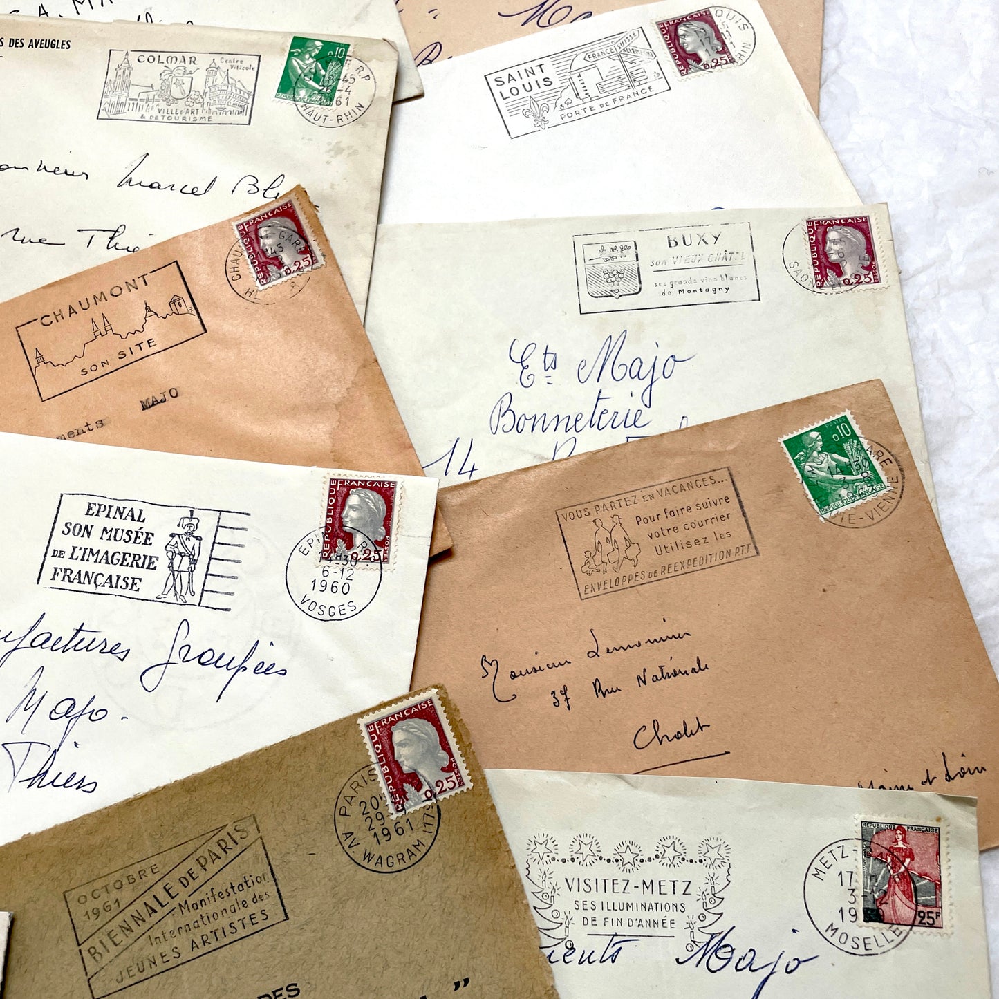 A batch of 20 vintage 1960s French envelopes featuring assorted postmarks, handwritten addresses, and Republic Française stam