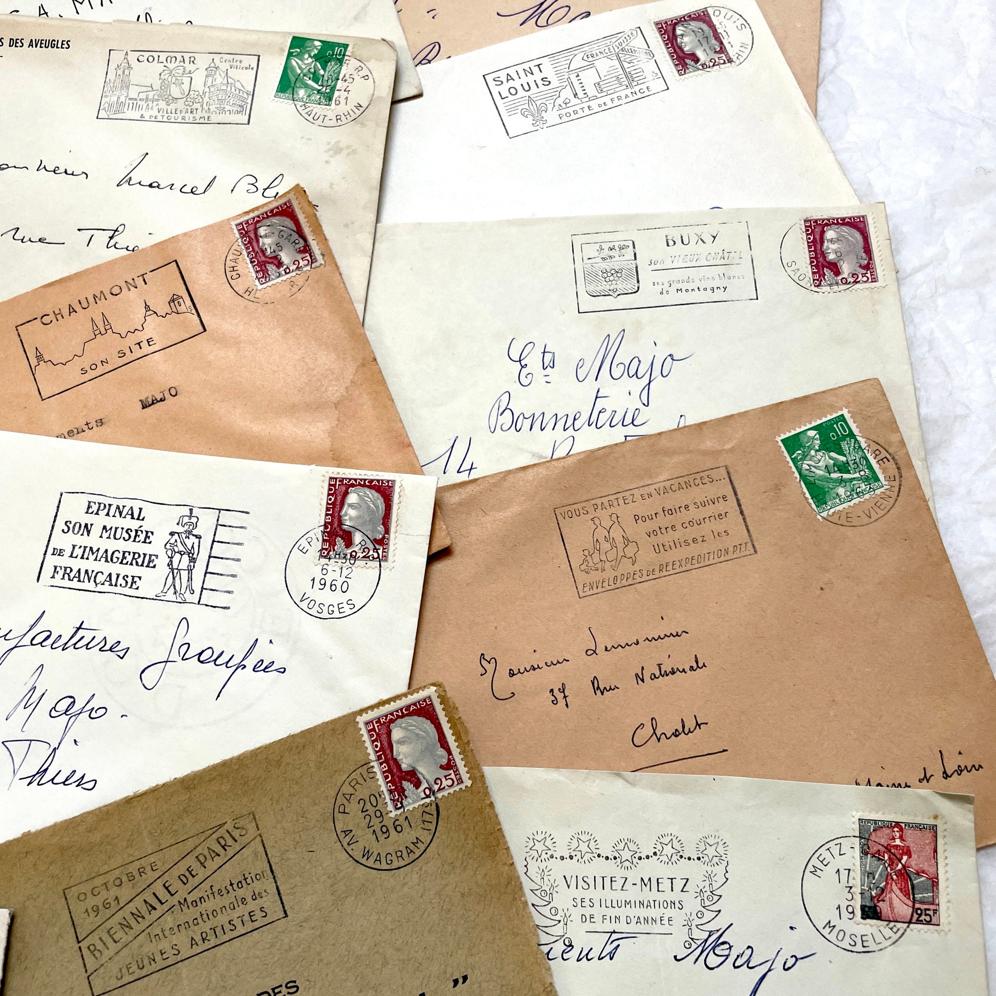 A batch of 20 vintage 1960s French envelopes featuring assorted postmarks, handwritten addresses, and Republic Française stam