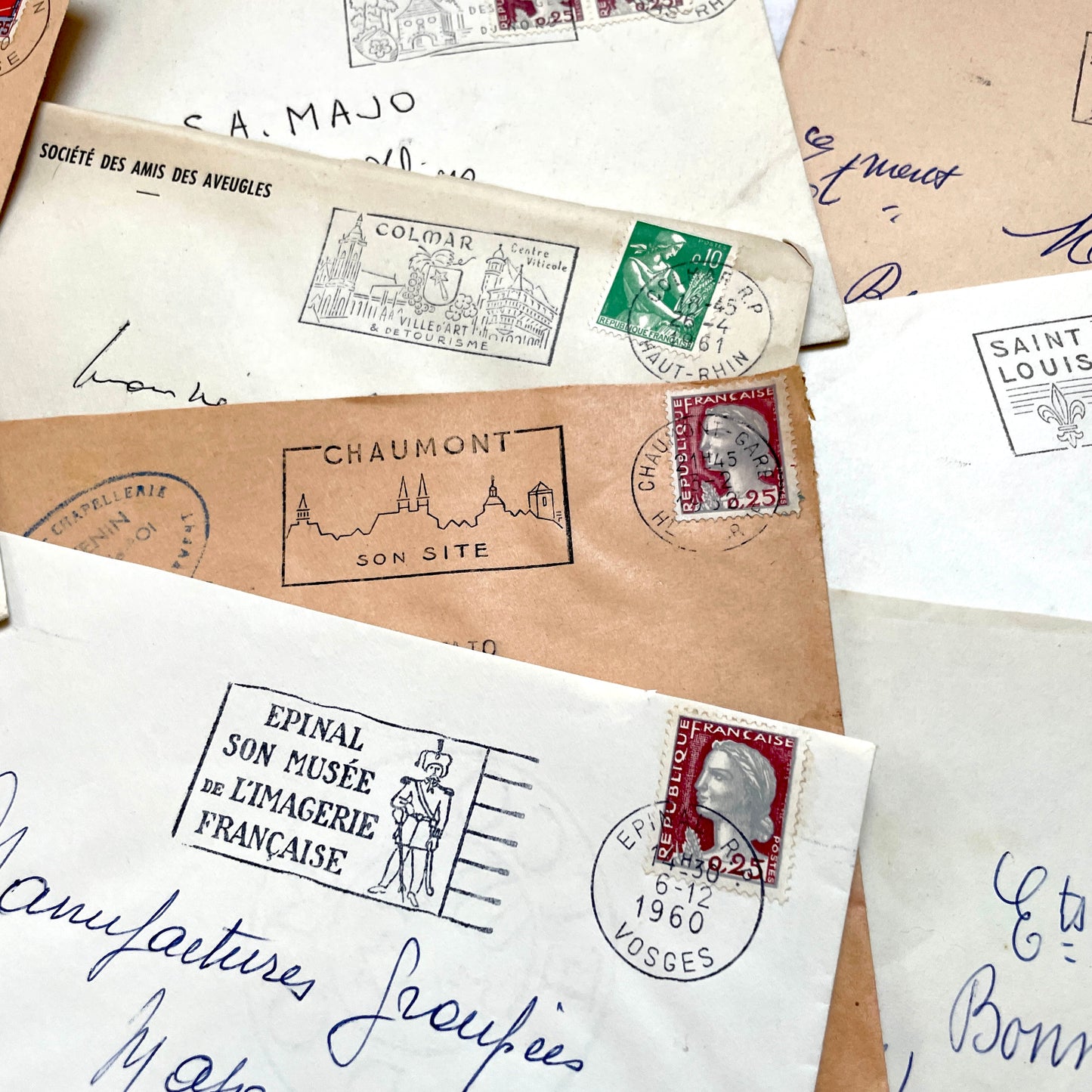 A batch of 20 vintage 1960s French envelopes featuring assorted postmarks, handwritten addresses, and Republic Française stam
