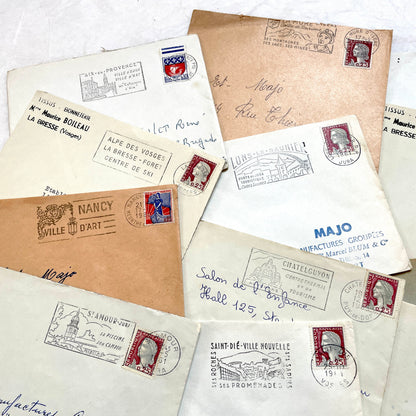 Vintage 1960s French envelopes lot featuring various stamps, postmarks, and handwritten addresses from across France.