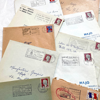 Vintage 1960s French envelopes lot featuring various stamps, postmarks, and handwritten addresses from across France.