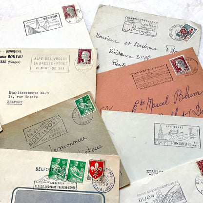 Vintage 1960s French envelopes lot featuring various stamps, postmarks, and handwritten addresses from across France.