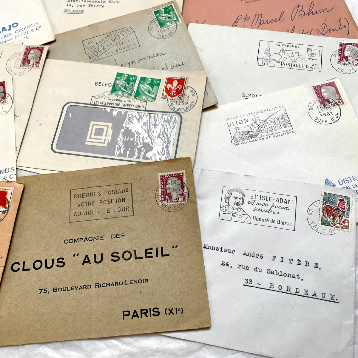 Vintage 1960s French envelopes lot featuring various stamps, postmarks, and handwritten addresses from across France.