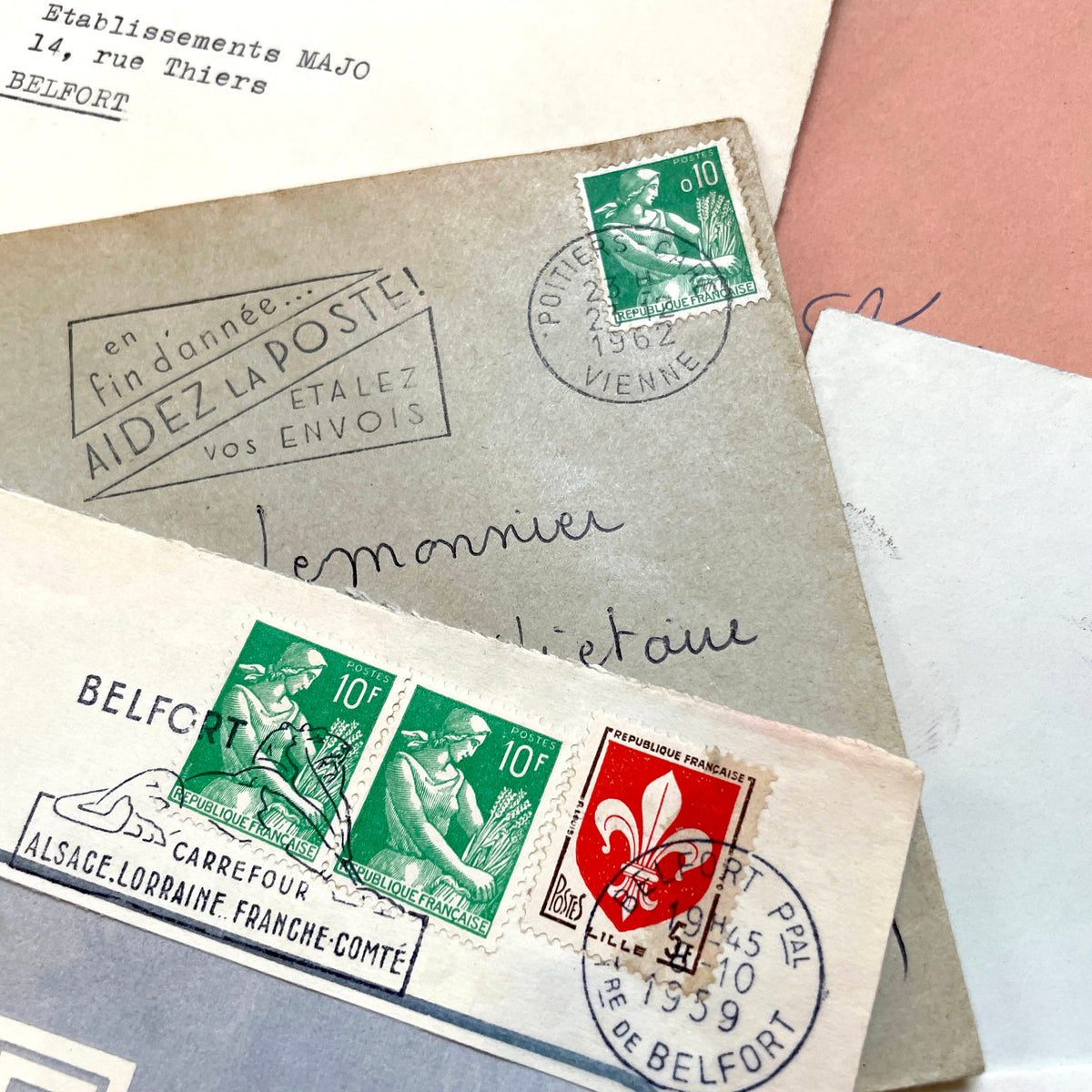 Vintage 1960s French envelopes lot featuring various stamps, postmarks, and handwritten addresses from across France.