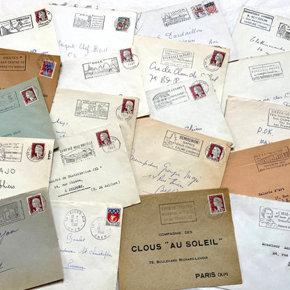 A lot of 20 French envelopes from the 1960s, featuring various postmarks, stamps, and handwritten addresses.