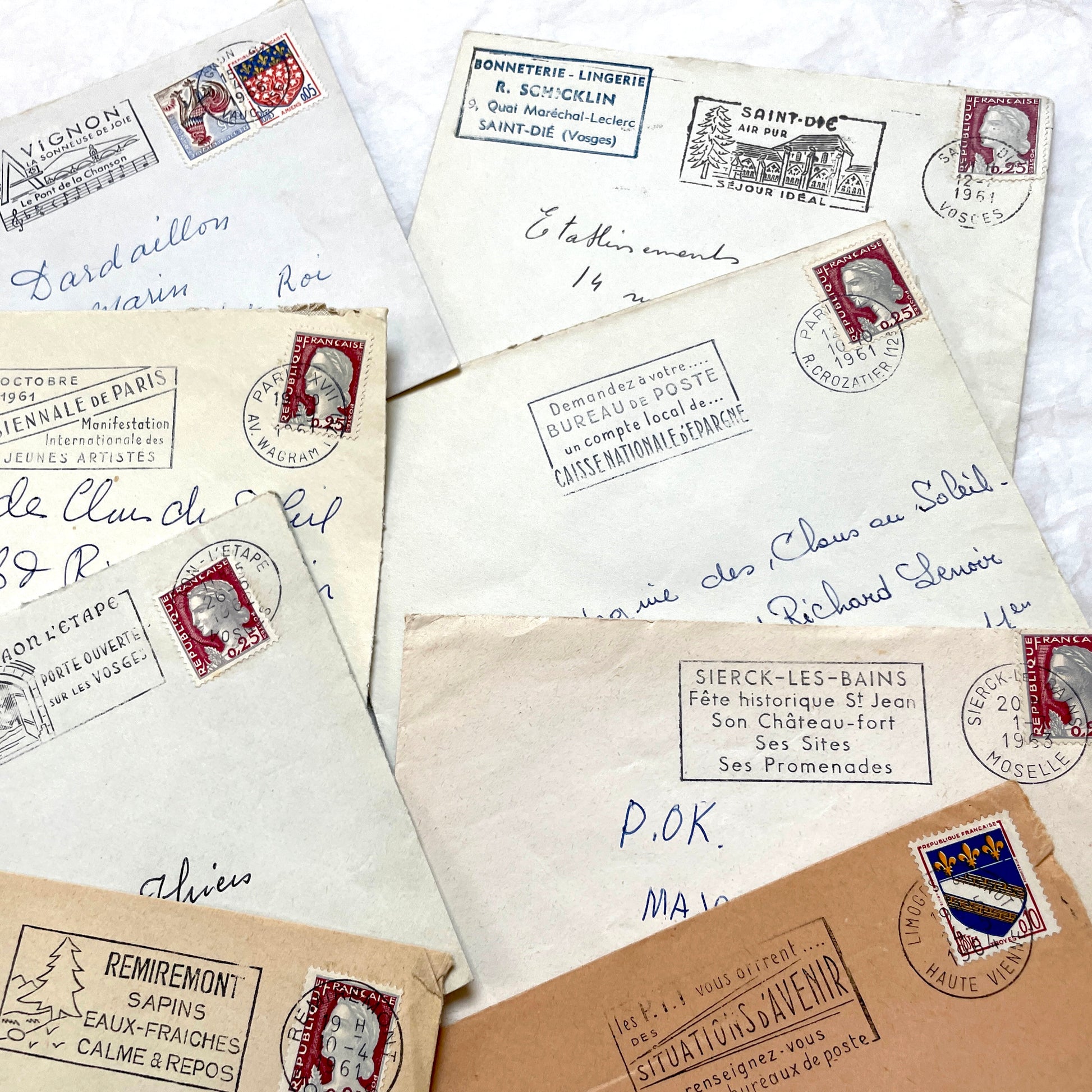 A lot of 20 French envelopes from the 1960s, featuring various postmarks, stamps, and handwritten addresses.