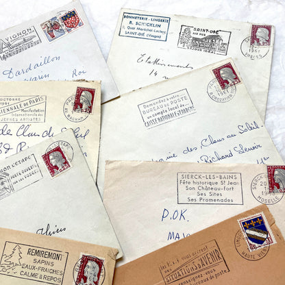 A lot of 20 French envelopes from the 1960s, featuring various postmarks, stamps, and handwritten addresses.