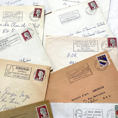 A lot of 20 French envelopes from the 1960s, featuring various postmarks, stamps, and handwritten addresses.