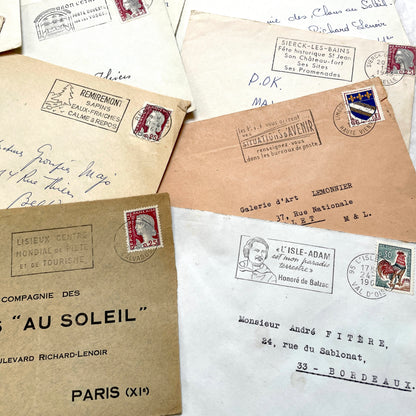 A lot of 20 French envelopes from the 1960s, featuring various postmarks, stamps, and handwritten addresses.