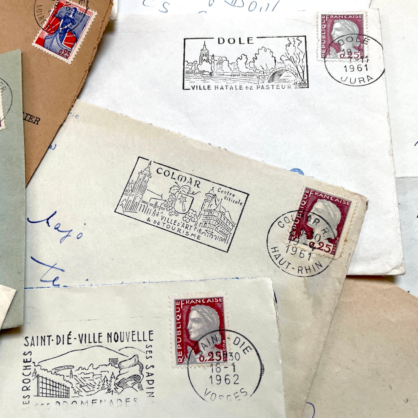 A lot of 20 French envelopes from the 1960s, featuring various postmarks, stamps, and handwritten addresses.