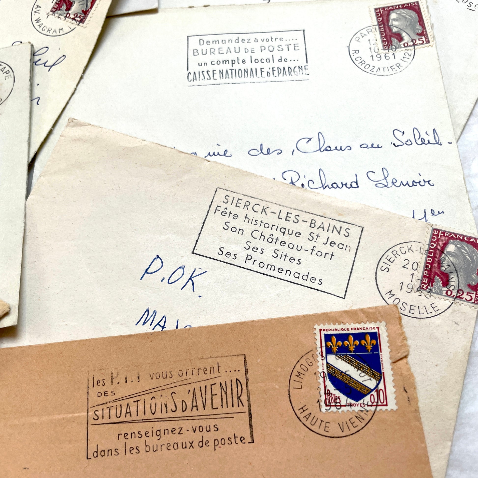 A lot of 20 French envelopes from the 1960s, featuring various postmarks, stamps, and handwritten addresses.