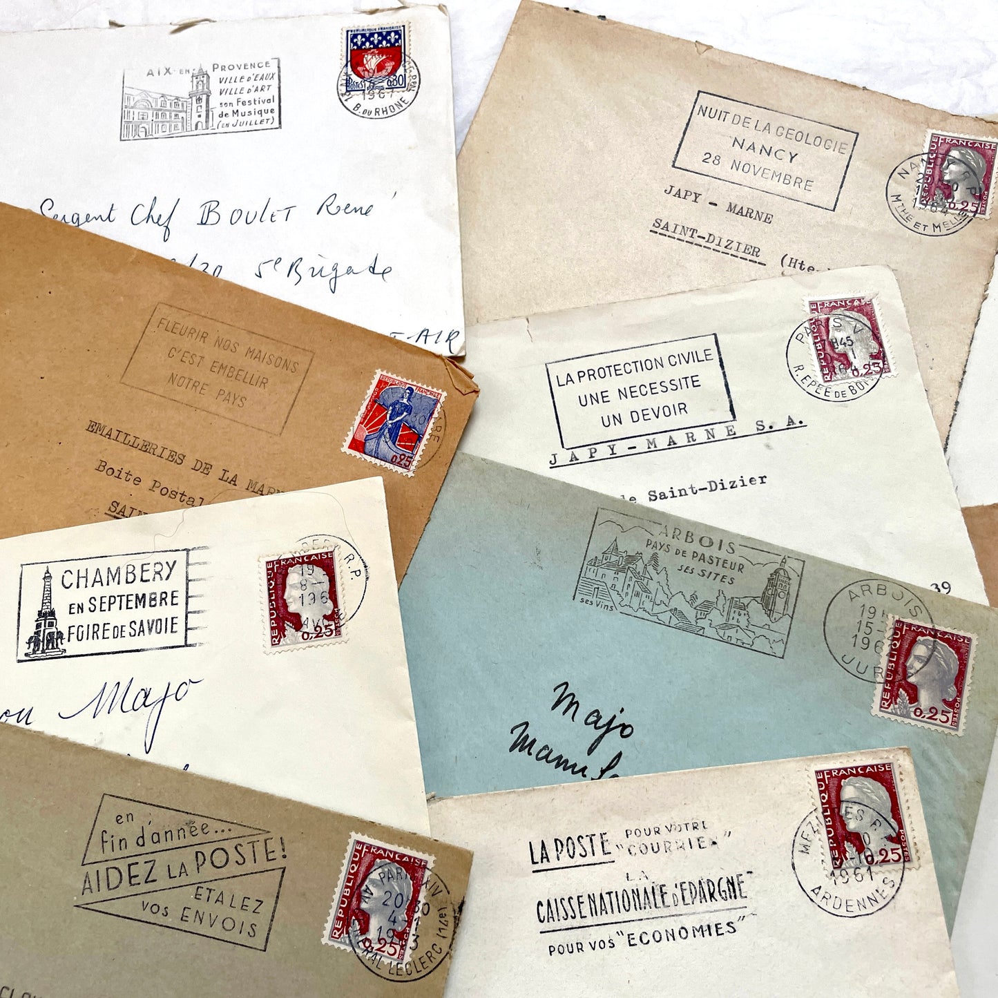 Lot of 20 vintage French envelopes from the 1960s, featuring various stamps, postmarks, and handwritten addresses.