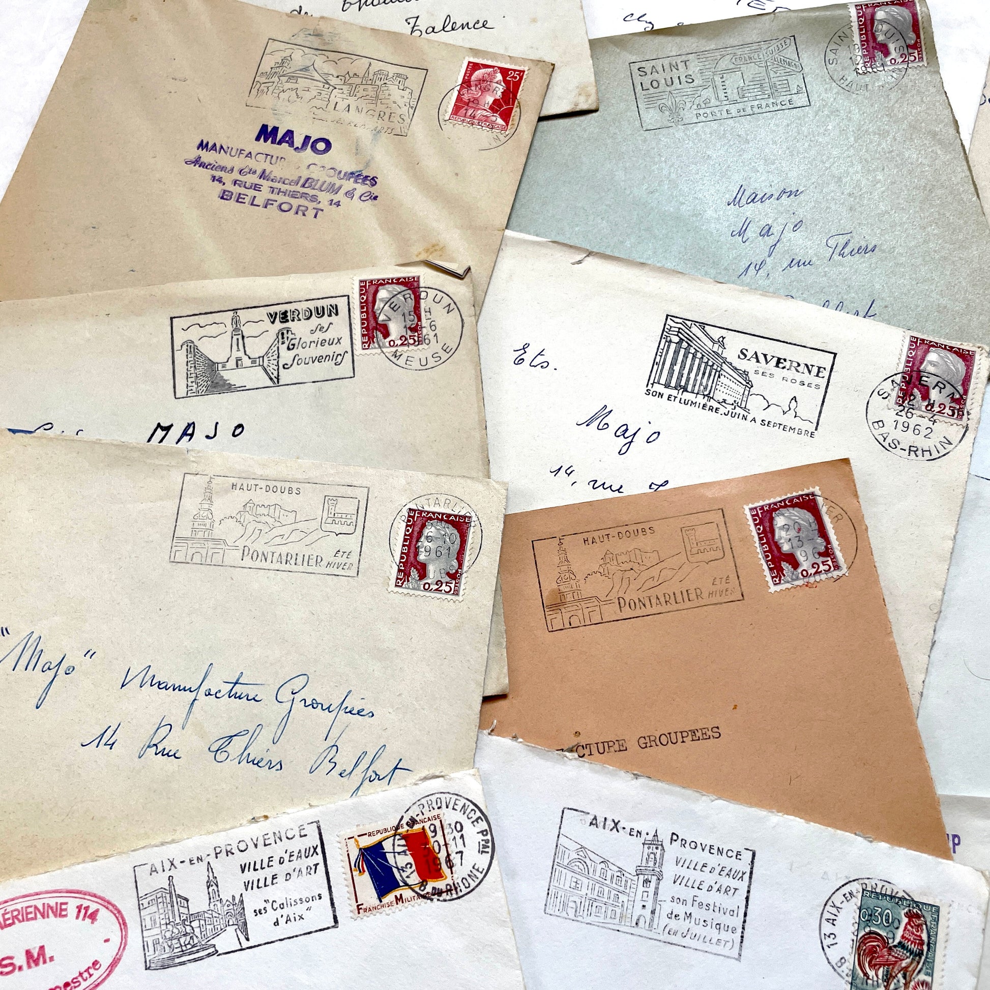 Lot of 20 1960s French envelopes with vintage stamps, diverse postmarks, and handwritten addresses.