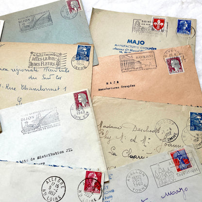 Lot of 20 1960s French envelopes with vintage stamps, diverse postmarks, and handwritten addresses.