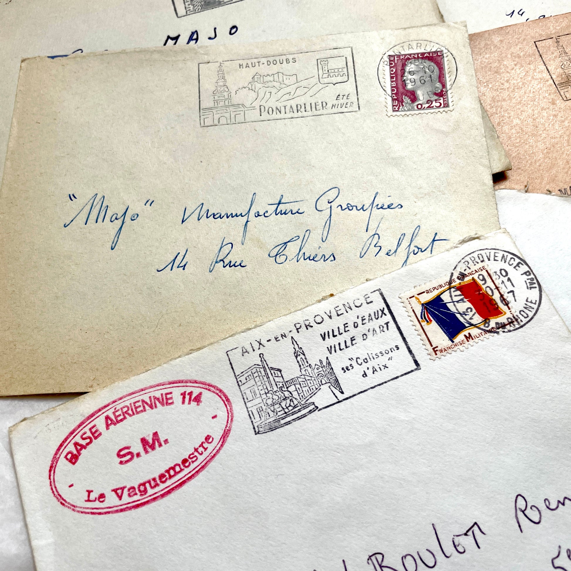 Lot of 20 1960s French envelopes with vintage stamps, diverse postmarks, and handwritten addresses.