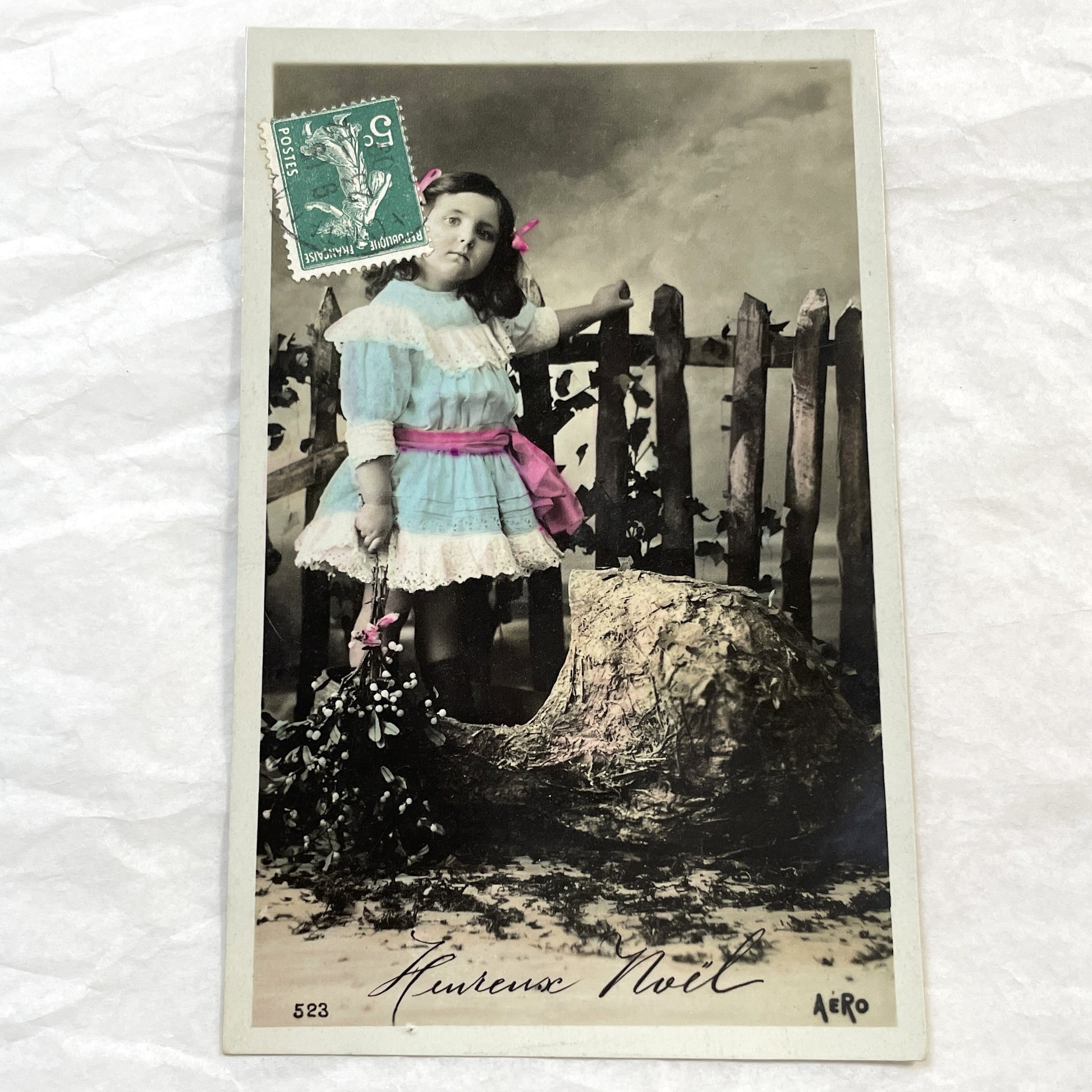 1910s - Vintage French Postcard - Young Girl with Mistletoe - Hand-Tinted Christmas Greeting - Rustic Scene - Aero Publisher Collectible