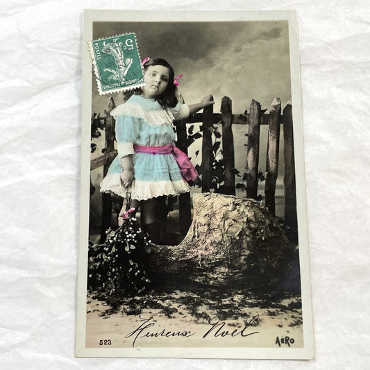 1910s - Vintage French Postcard - Young Girl with Mistletoe - Hand-Tinted Christmas Greeting - Rustic Scene - Aero Publisher Collectible