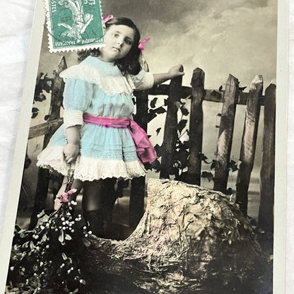 1910s - Vintage French Postcard - Young Girl with Mistletoe - Hand-Tinted Christmas Greeting - Rustic Scene - Aero Publisher Collectible