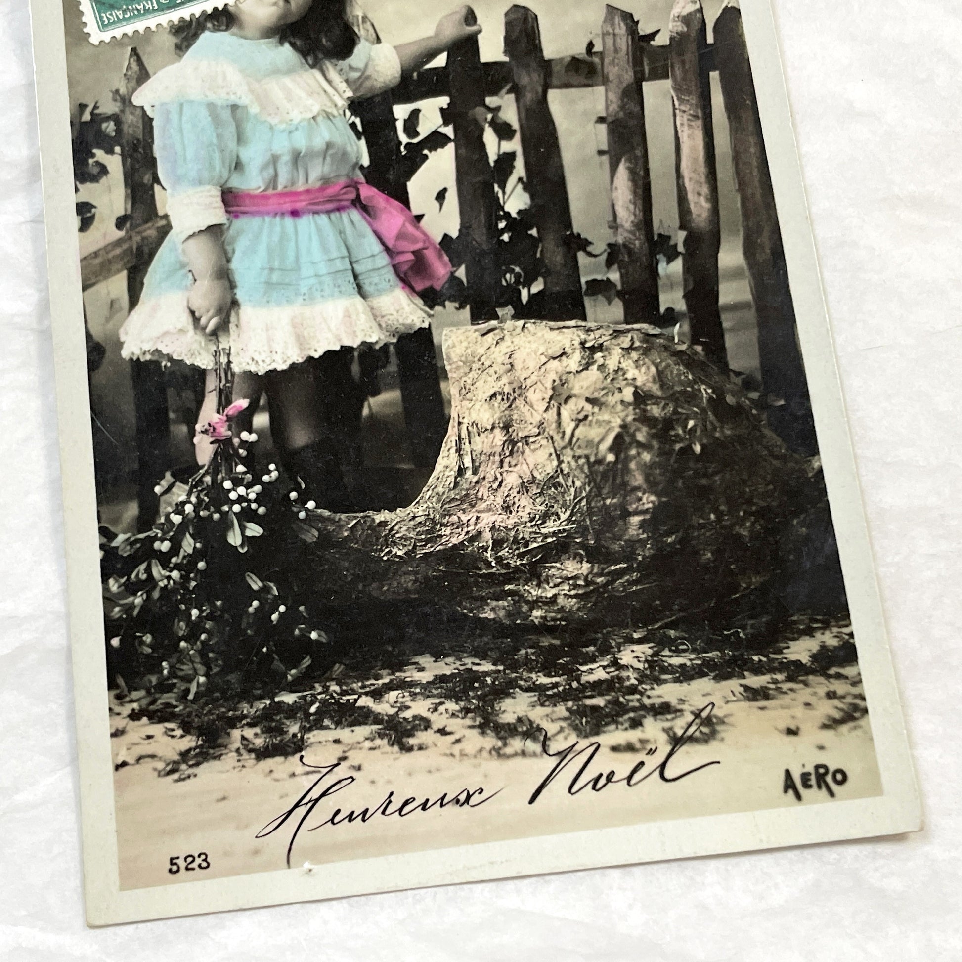 1910s - Vintage French Postcard - Young Girl with Mistletoe - Hand-Tinted Christmas Greeting - Rustic Scene - Aero Publisher Collectible