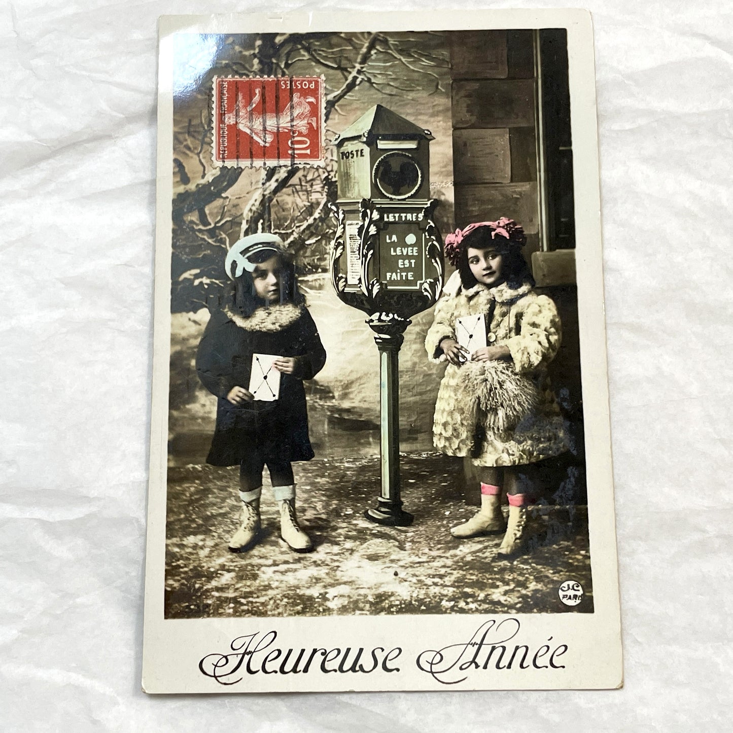 1910s - Vintage French Postcard - Two Children with Mailbox - Heureuse Année - Hand-Tinted Collectible - Antique Ephemera