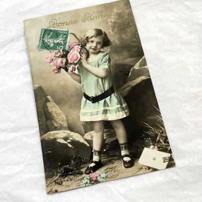 1910s - French Postcard - Young Girl with Flowers - Happy New Year Greeting - Antique Collectible Ephemera - Hand-Colored Photo