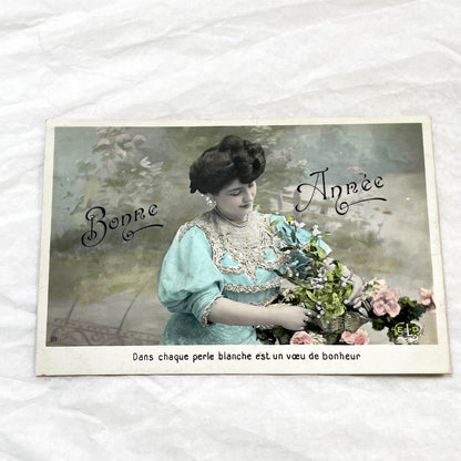 1900s - Vintage French New Year Postcard - Elegant Woman Floral Basket - Hand-Tinted Collectible Ephemera for Scrapbooking