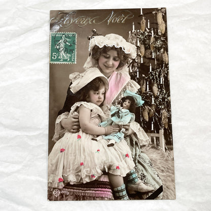 1910s - Vintage French Christmas Postcard - Mother and Child with Doll - Hand-Tinted Belle Époque Holiday Greeting - Children Portrait