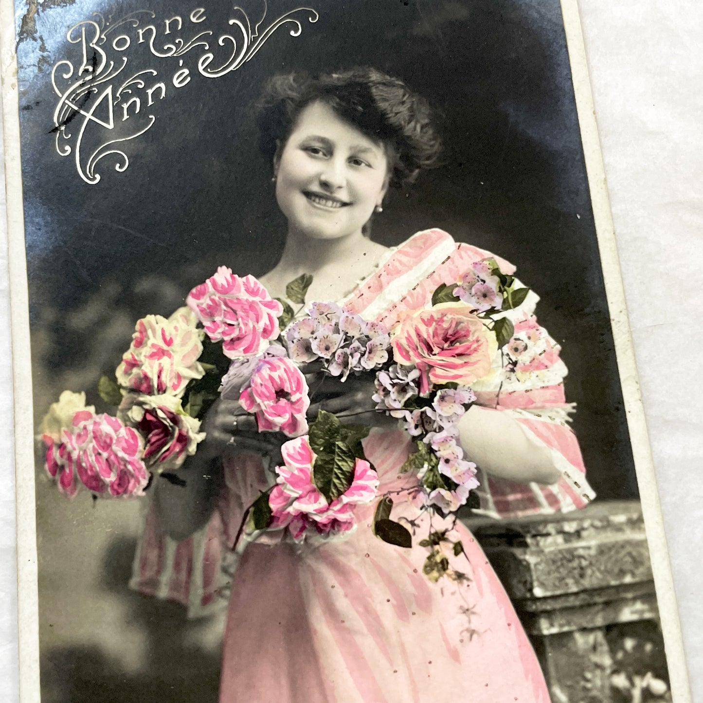 1910s - French New Year Postcard - Belle Epoque Hand-Tinted Smiling Woman - Pink Dress - Floral Bouquet - Elegant Vintage Collectible