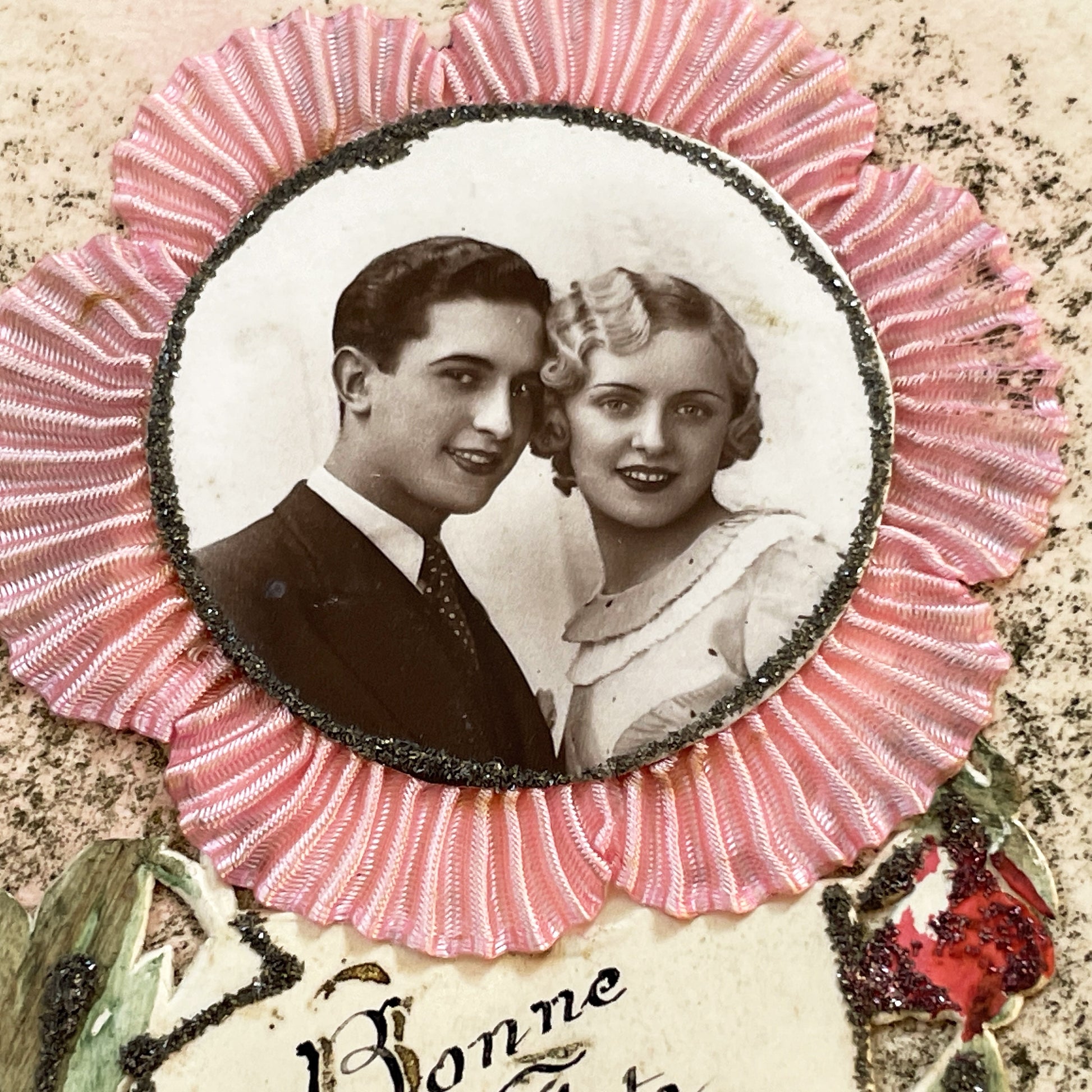 1930s - Vintage French Bonne Fête Greeting Card - Young Couple Photo - Embossed Pink Ribbon - Green Glitter Laurel - Keepsake Ephemera