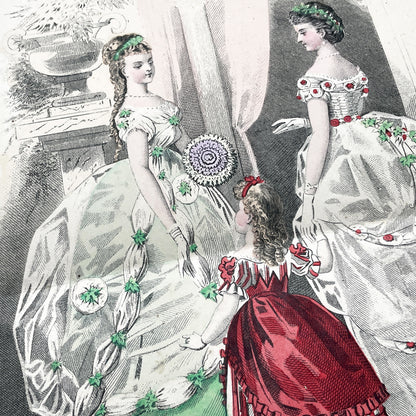 1860s French fashion plate depicting two women in elaborate ball gowns and a child in a red and white striped dress.
