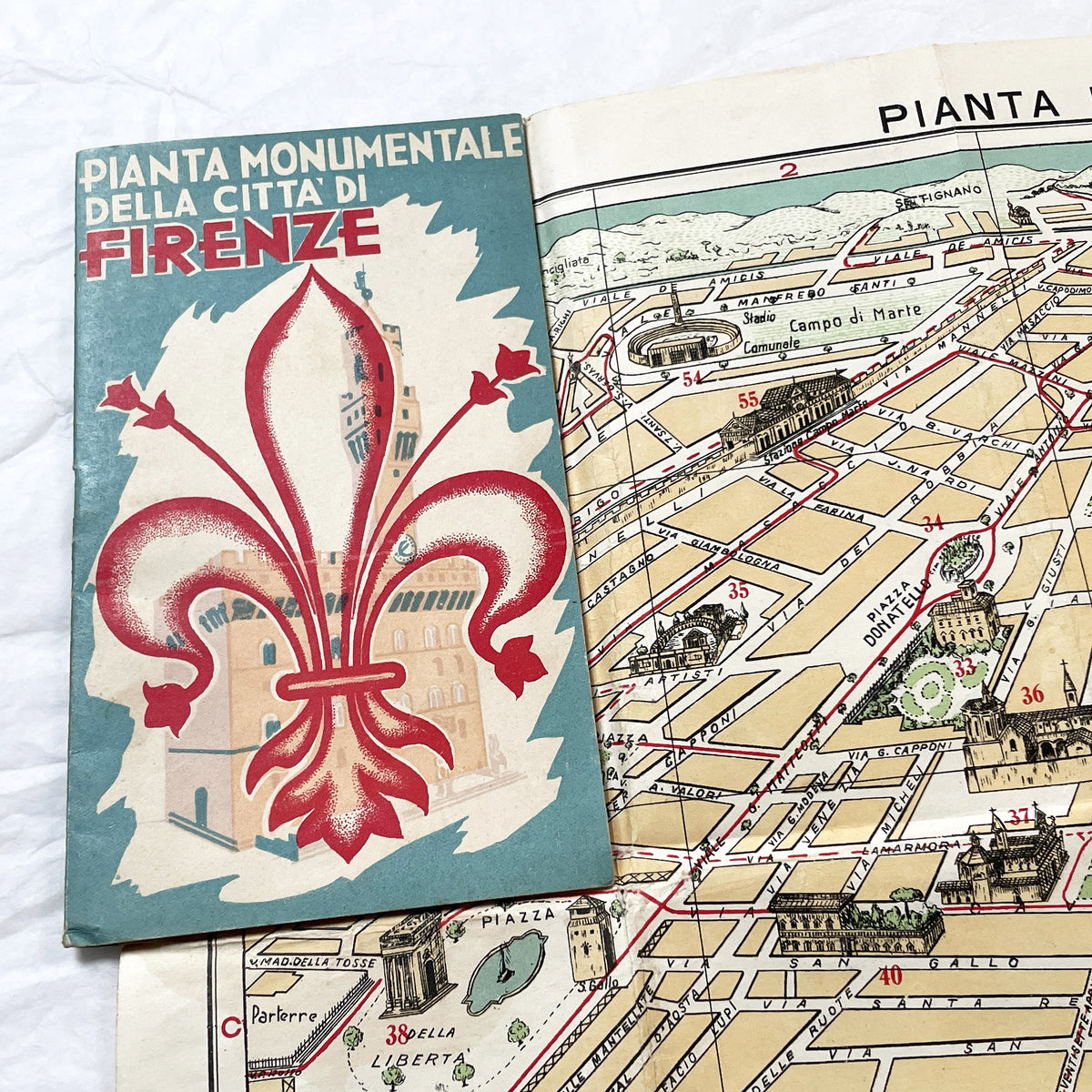 1950s vintage Italian map of Florence with index booklet, showing city plan and the Florentine lily emblem.