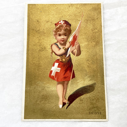 1900s - Vintage Chromo - Little Swiss Girl in Traditional Dress Holding Flag - Golden Background - Collectible Ephemera