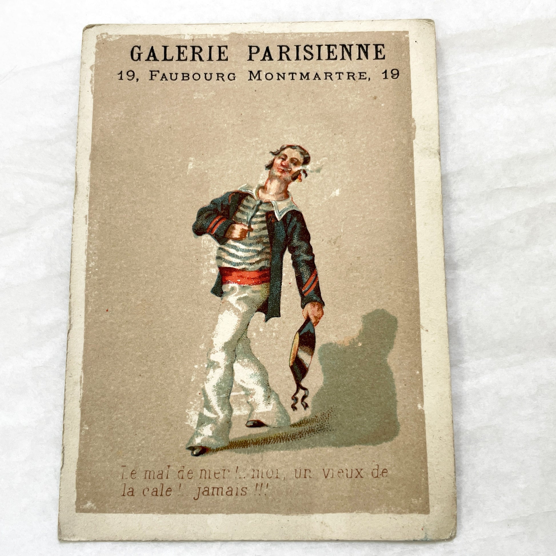 Late 19th - 2 Trade Cards - Parisian Haberdashery Advertising Chromos - Humorous Sailor and Strongman Illustrations - Vintage Ephemera