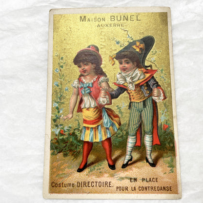 Late 19th - Vintage French Trade Card - Gilded Chromo - Directoire Costumes - Advertising Maison Bunel Auxerre Department Store