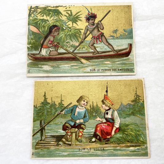 Late 19th - 2 Antique French Chromo Trade Cards - World Scenes - Voyage Themes - Rousseau Clothing Advertisement - Collectible Ephemera Set