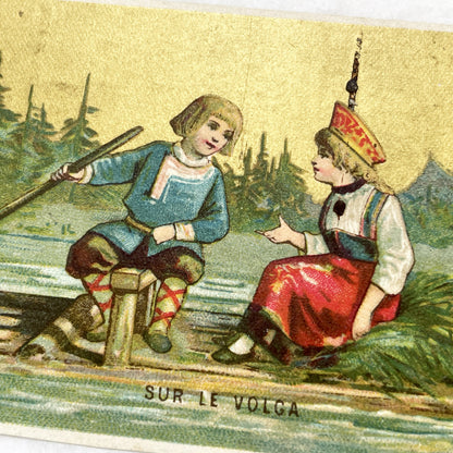 Late 19th - 2 Antique French Chromo Trade Cards - World Scenes - Voyage Themes - Rousseau Clothing Advertisement - Collectible Ephemera Set