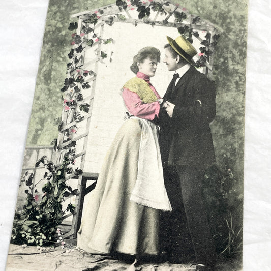 1900s - Vintage Hand-Tinted Postcard - Romantic Couple Under Arbor - 'Aurelia' Caption - Edwardian Era Lovers - Antique Collectible