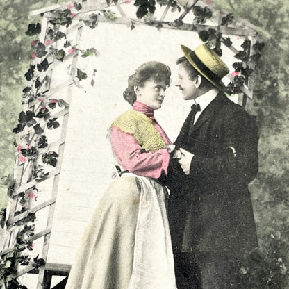 1900s - Vintage Hand-Tinted Postcard - Romantic Couple Under Arbor - 'Aurelia' Caption - Edwardian Era Lovers - Antique Collectible