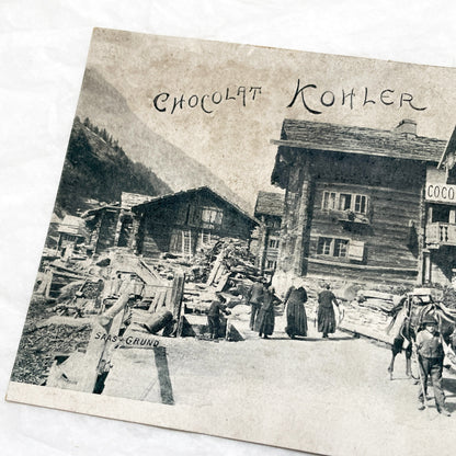 1900s - Vintage Swiss Saas-Grund Village Scene Postcard with Chocolat Kohler Advertising and Alpine Lifestyle - Collectible Ephemera.
