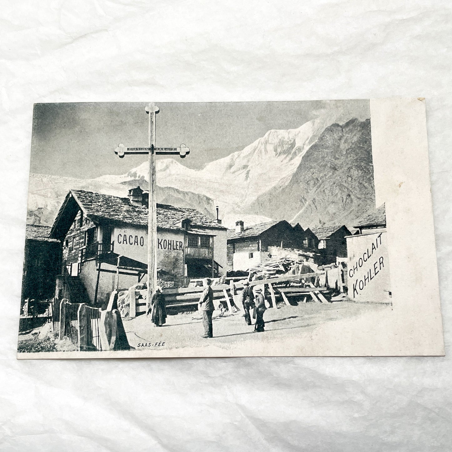 1900s - Vintage Swiss Alps Postcard - Saas-Fee Village Scene with Kohler Chocolate Advertisements - Historic Mountain Landscape