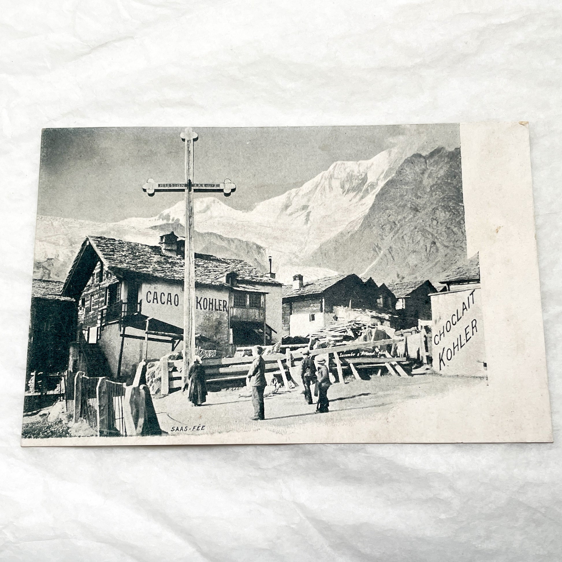 1900s - Vintage Swiss Alps Postcard - Saas-Fee Village Scene with Kohler Chocolate Advertisements - Historic Mountain Landscape