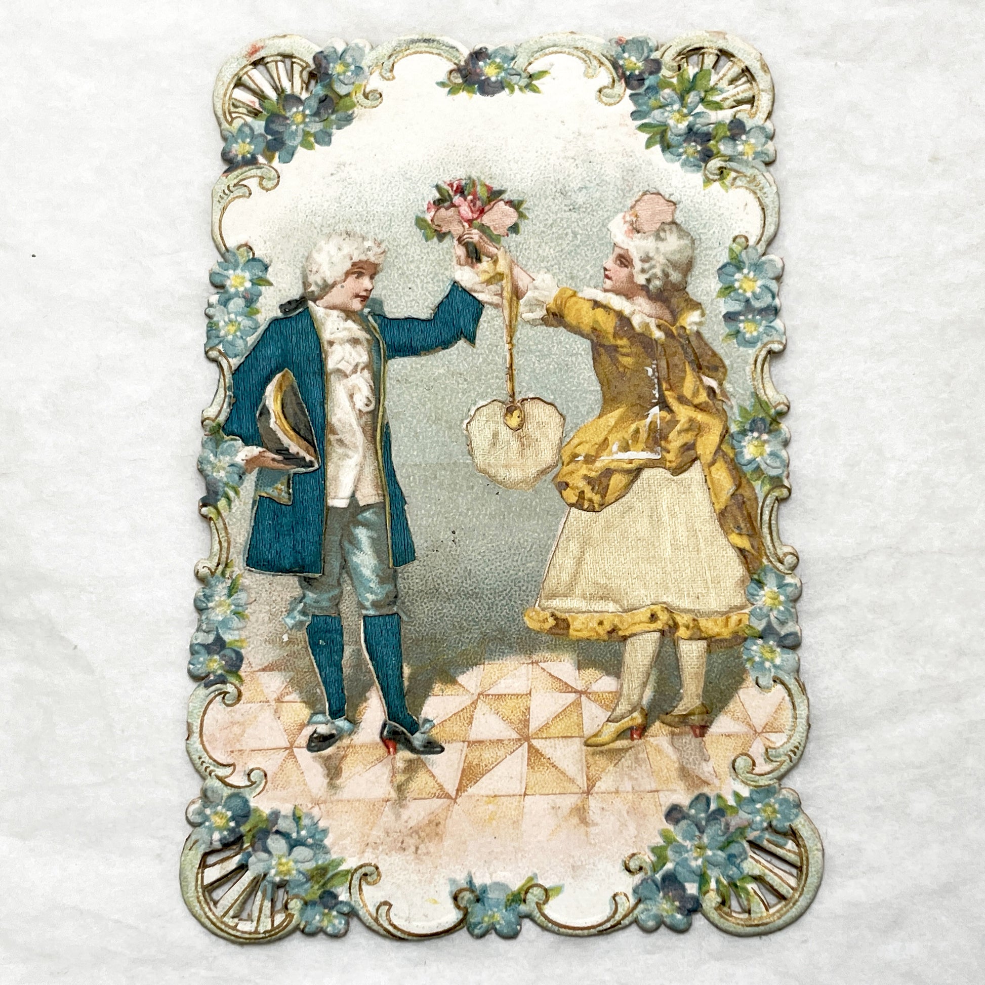 Late 19th - Elegant Victorian Die-Cut Chromo Card - Romantic Couple Exchanging Flowers - Forget-Me-Not Floral Frame - Collectible Art