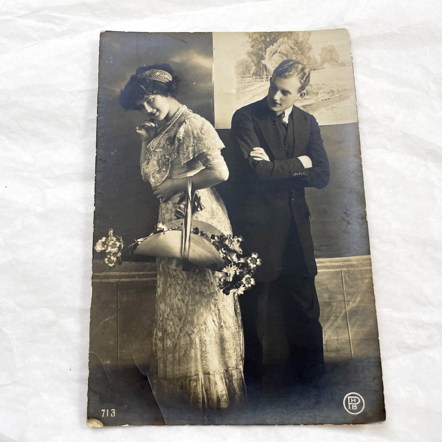1910s - Vintage Postcard Edwardian Couple - Shy Woman with Flowers Basket - Man with Crossed Arms - Romantic Sepia Photography - Love Scene