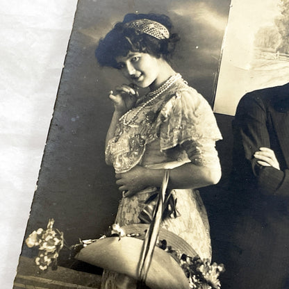 1910s - Vintage Postcard Edwardian Couple - Shy Woman with Flowers Basket - Man with Crossed Arms - Romantic Sepia Photography - Love Scene