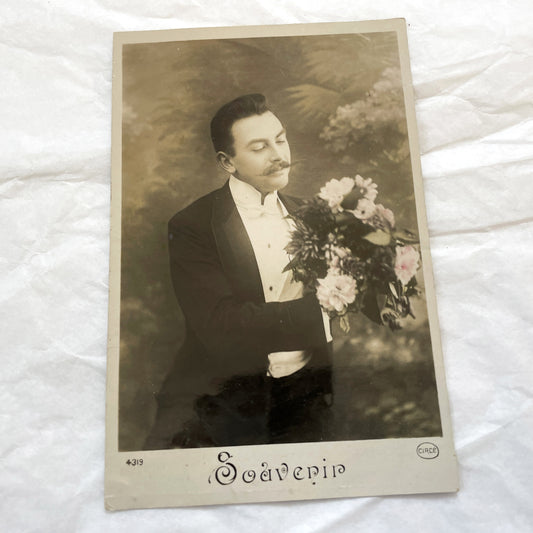 1900s - Vintage Gentleman Photo Postcard - Man With Moustache Holding Flowers - Old Sepia Souvenir Card