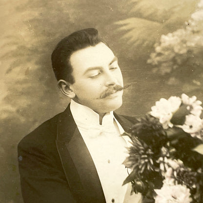 1900s - Vintage Gentleman Photo Postcard - Man With Moustache Holding Flowers - Old Sepia Souvenir Card