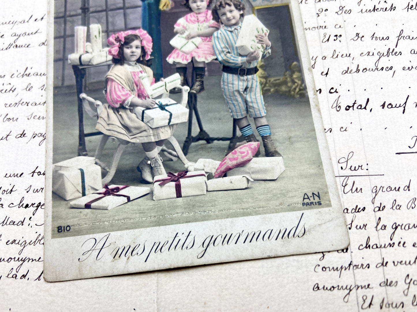 1900s - Antique French Postcard - Charming Children Receiving Gifts - Hand-Tinted Festive Scene - Paris Ephemera Art - Old Gourmands Card