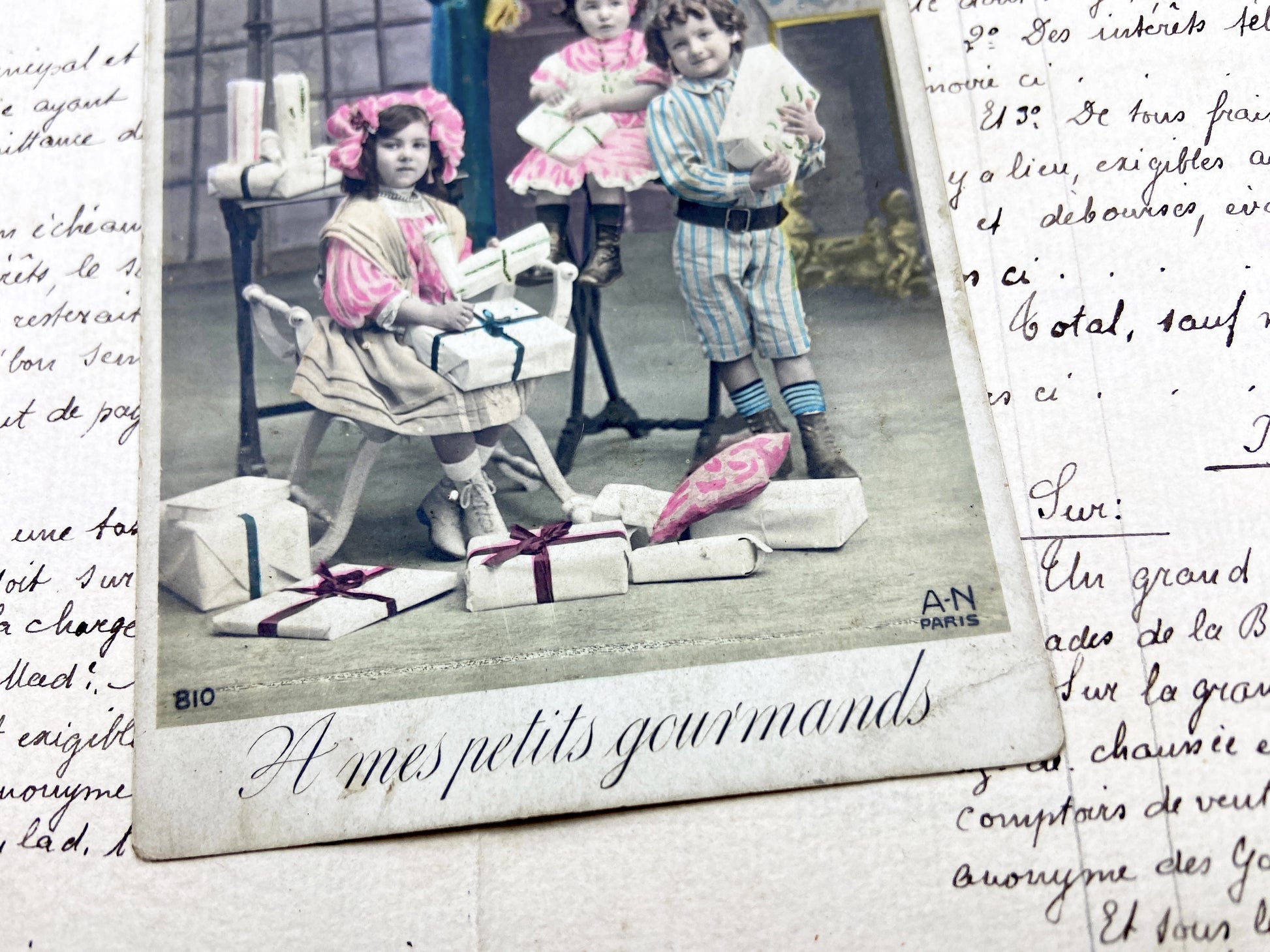 1900s - Antique French Postcard - Charming Children Receiving Gifts - Hand-Tinted Festive Scene - Paris Ephemera Art - Old Gourmands Card